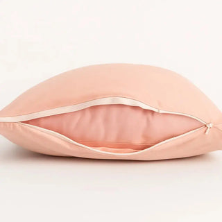 Peach-toned bamboo Cloud Case™ pillow cover – stackable layering technology for maximum softness and customization.