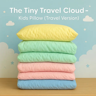 Stack of colorful kids pillows with a blue background and 'The Tiny Travel Cloud' text.